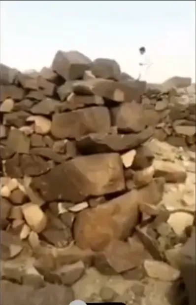 The remains of the temple. Notice how small the man is in comparison to the rocks.